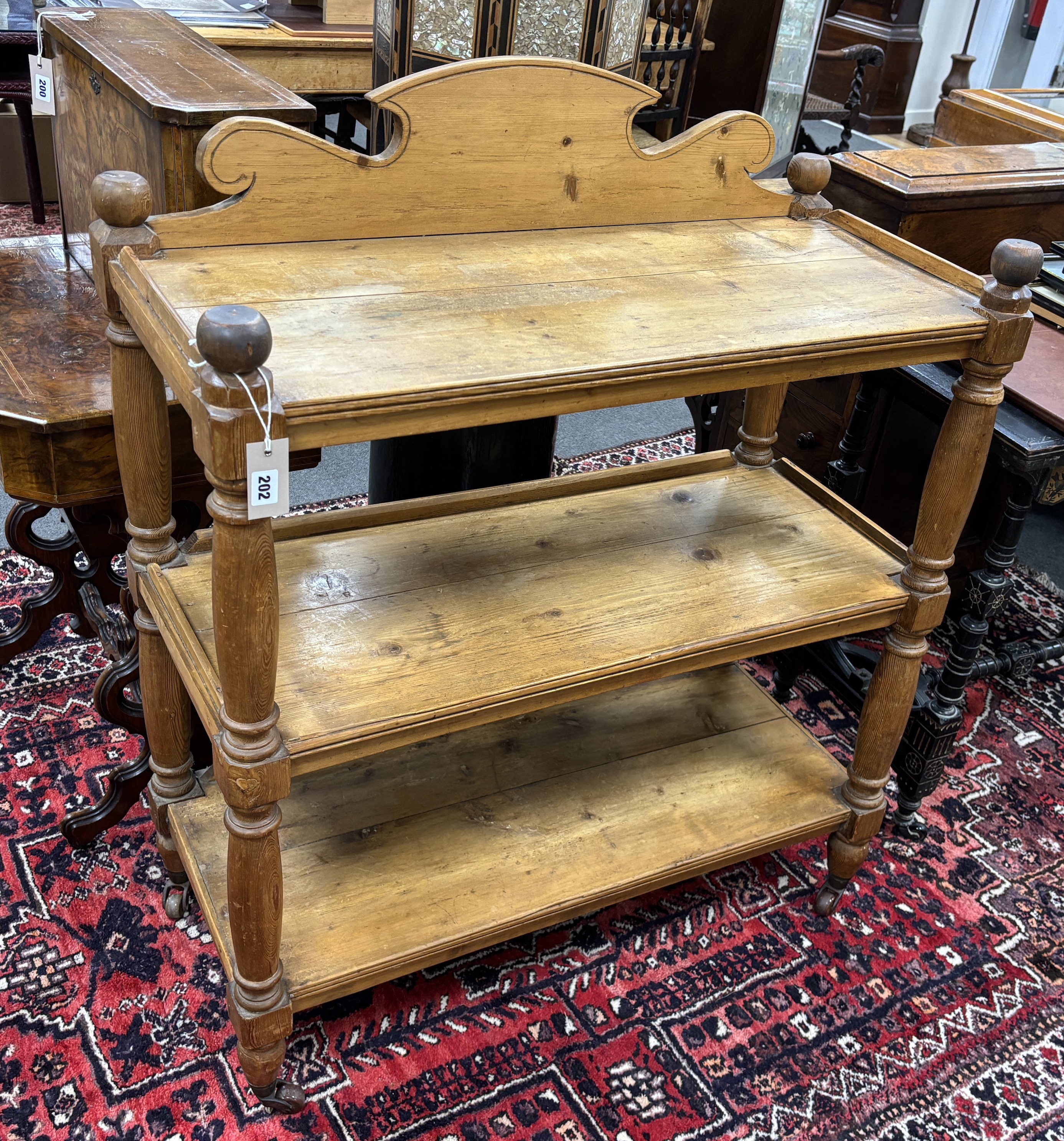 A Victorian pine three tier buffet, width 92cm, depth 43cm, height 110cm